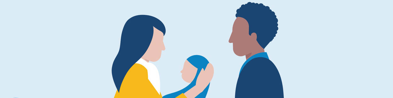 Een man en vrouw met een baby